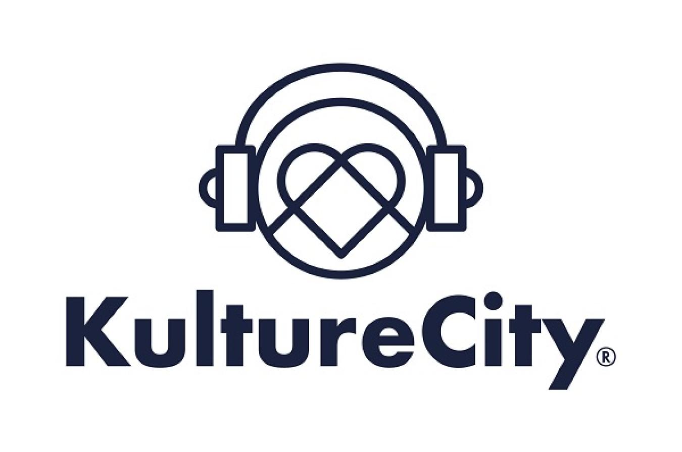 KultureCity logo, a heart with a circle around it and ear phones on the cirlcel