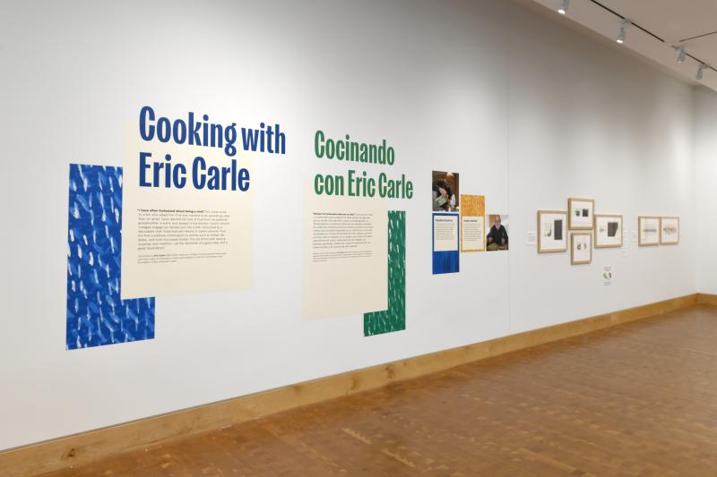 Photograph of gallery showing framed art and graphics.