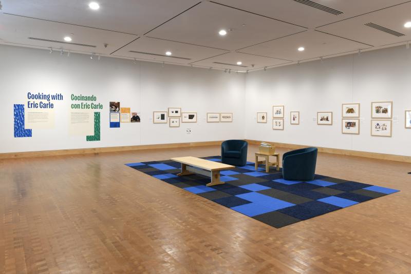 Photograph of gallery showing framed art and graphics.