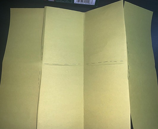 construction paper folded into 8 sections