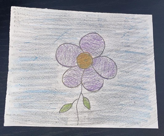 Drawing of a flower on top of a rough textured background