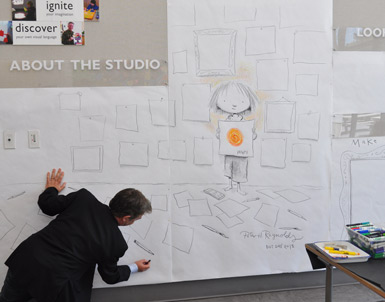 Peter H. Reynolds drawing mural at The Carle