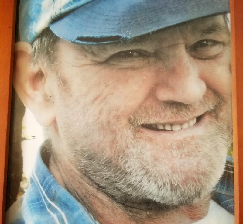 Photo of a person wearing a blue hat