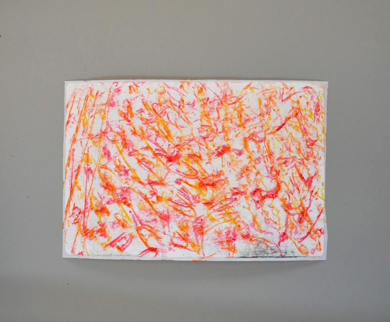 large sticker label covered with crayon textures