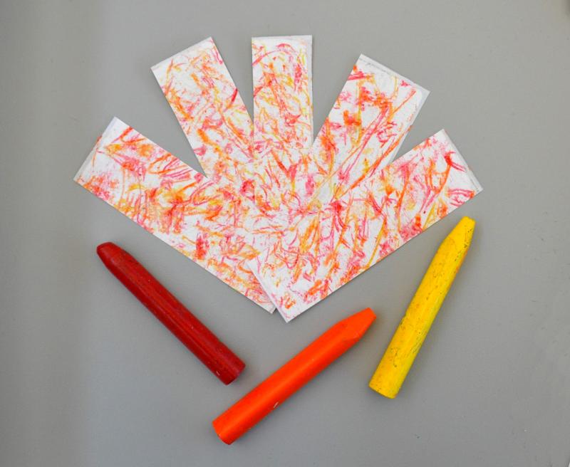 rectangle patterned stickers with red, orange, and yellow crayons