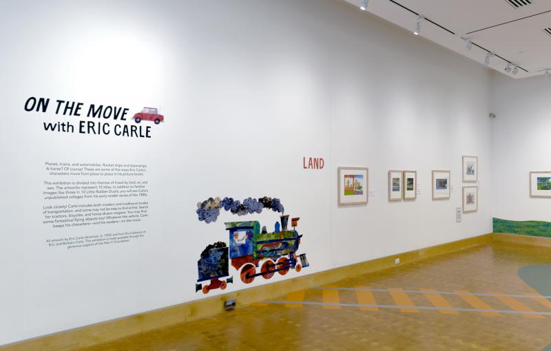 Installation image showing walls with framed art.