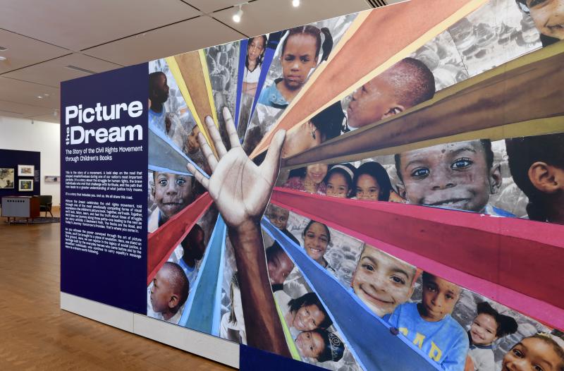 Installation image of introductory wall with Bryan Collier artwork.