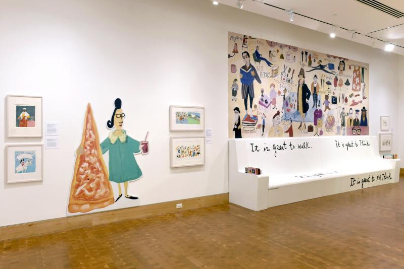 Installation image showing walls with framed art.