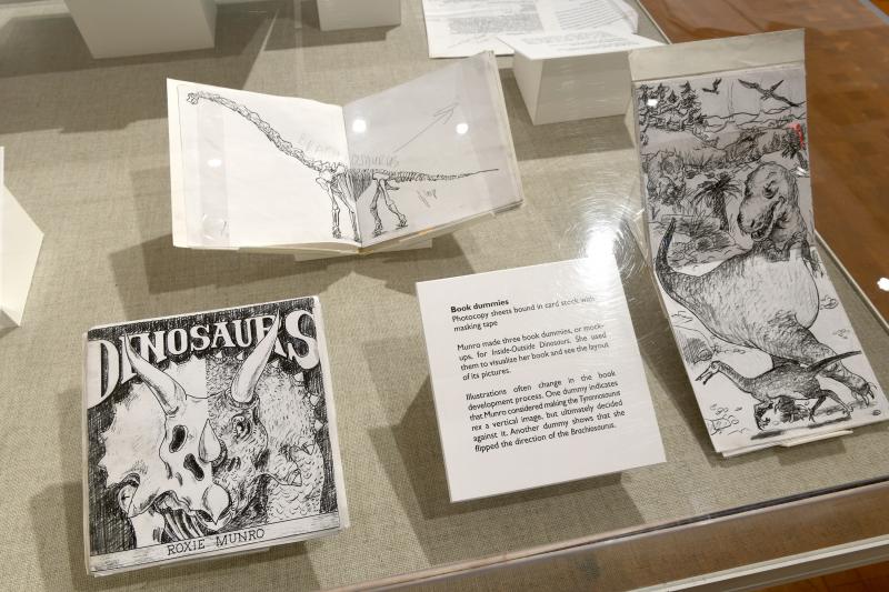 Installation image showing case with preparatory sketches.