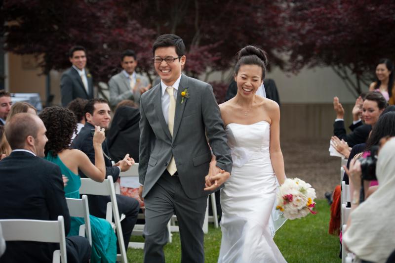 Couple walking down the aisle at their wedding.