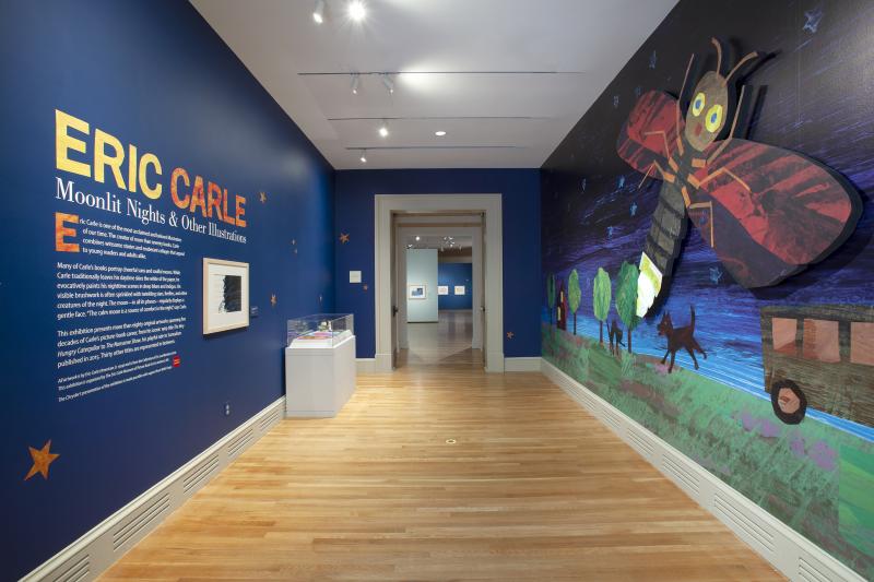 Installation image showing walls with framed art.