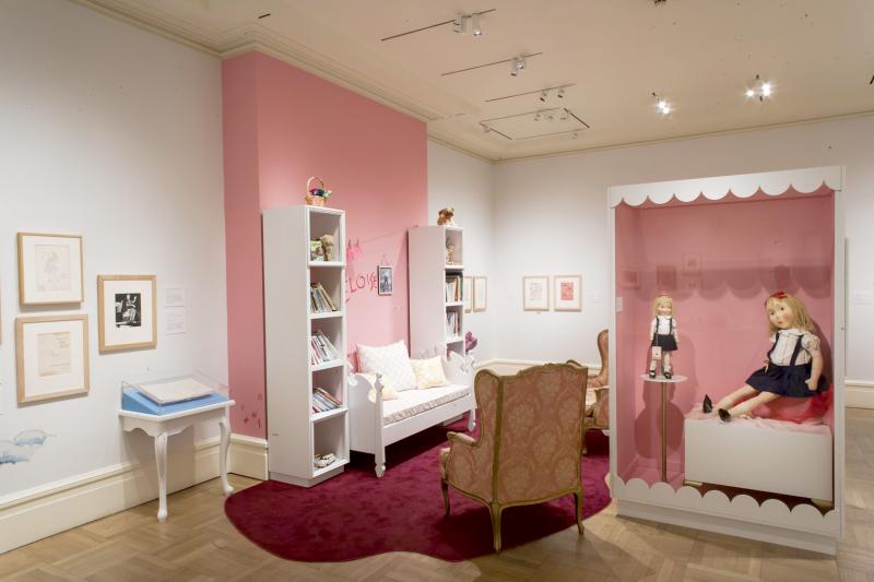 Installation image showing walls with framed art.