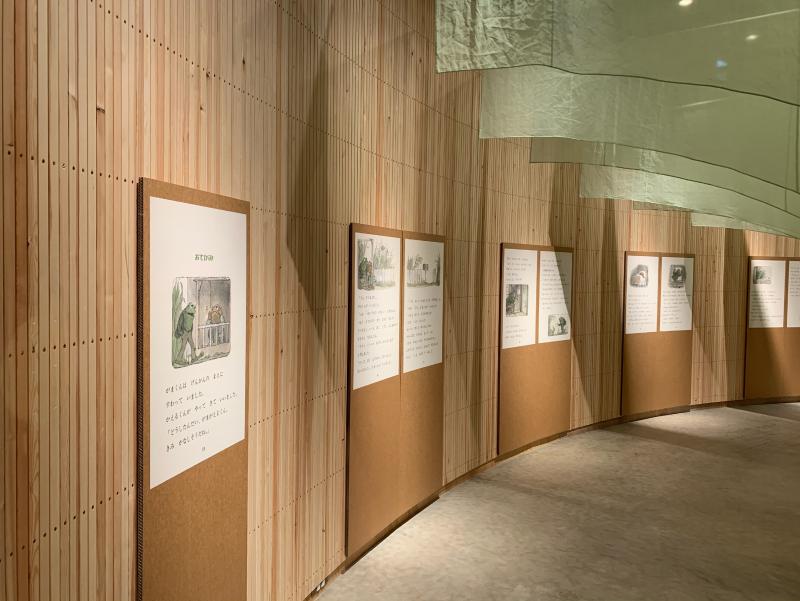 Installation image showing walls with framed art.