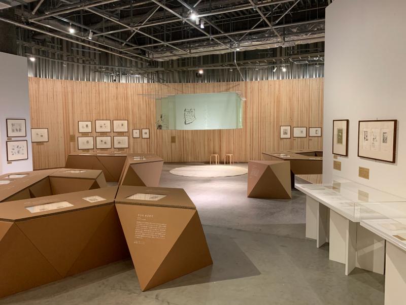 Installation image showing walls with framed art.