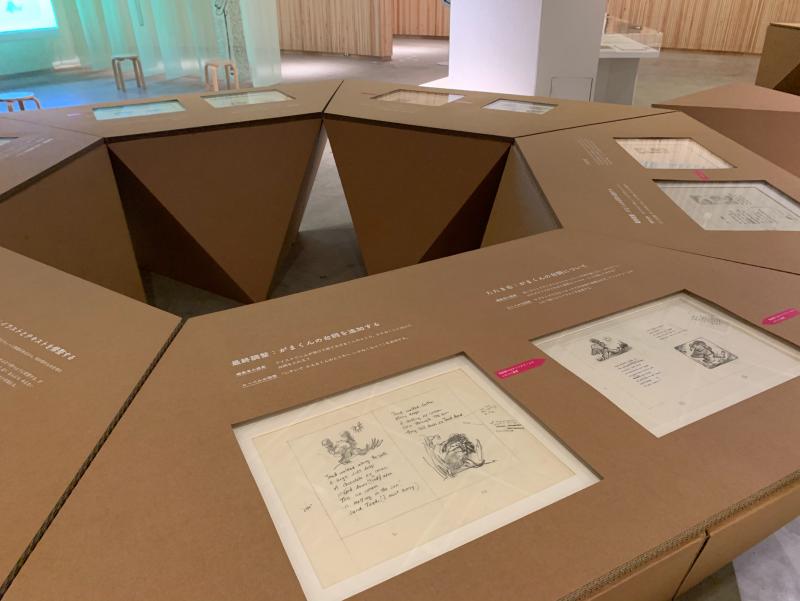 Installation image showing walls with framed art.