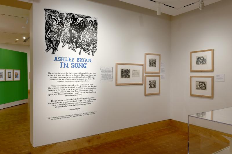 Installation image showing walls with framed art.