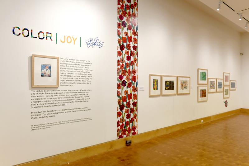 Installation image showing walls with framed art.