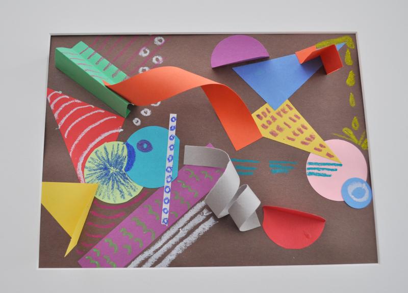 3D and 2D paper shapes including spirals, triangles, circles and rectangles of many colors
