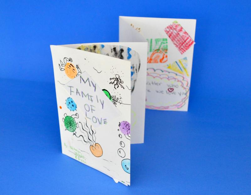An accordion fold book titled "My Family of Love" with collage illustrations.