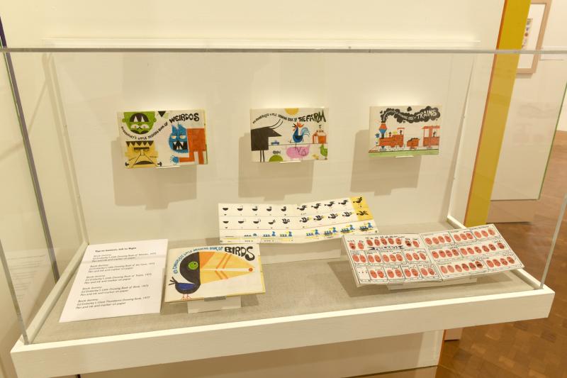 Installation image showing walls with framed art.