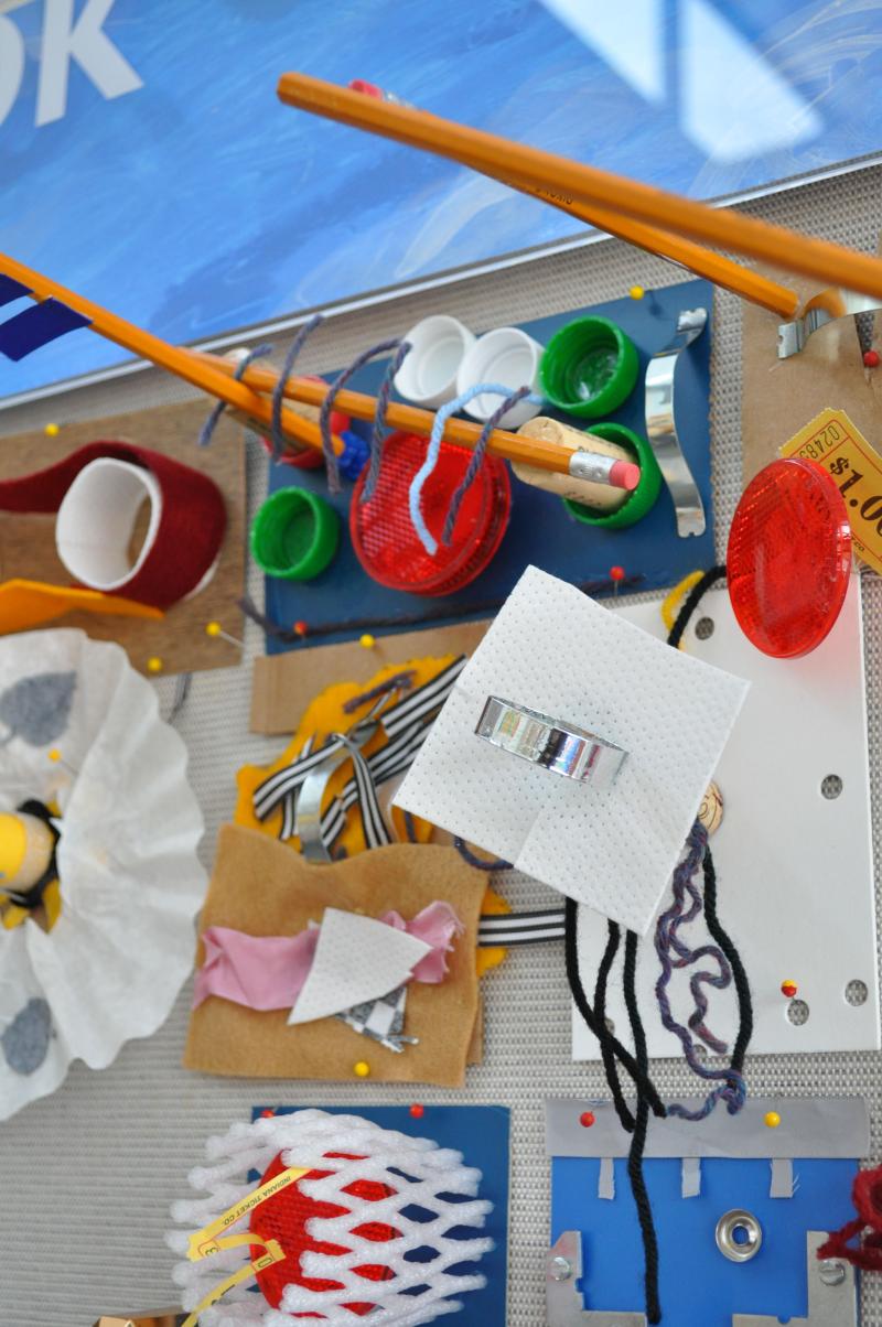 Several found material sculptures made out of found objects like pencils, coffee filters, and bottle caps.