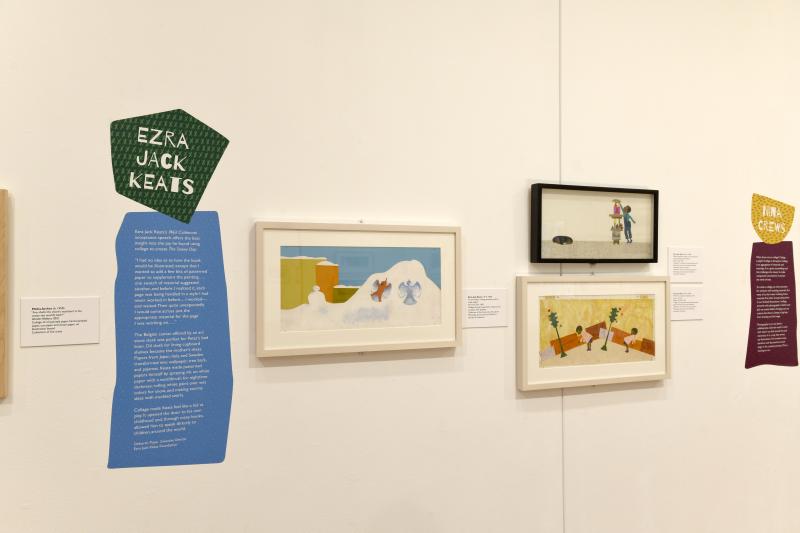 Installation image showing walls with framed art.