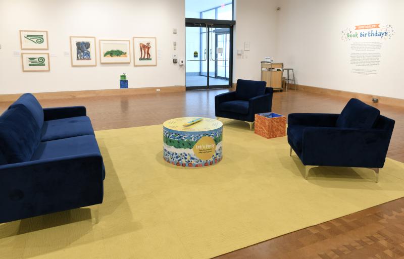 Installation image showing walls with framed art.