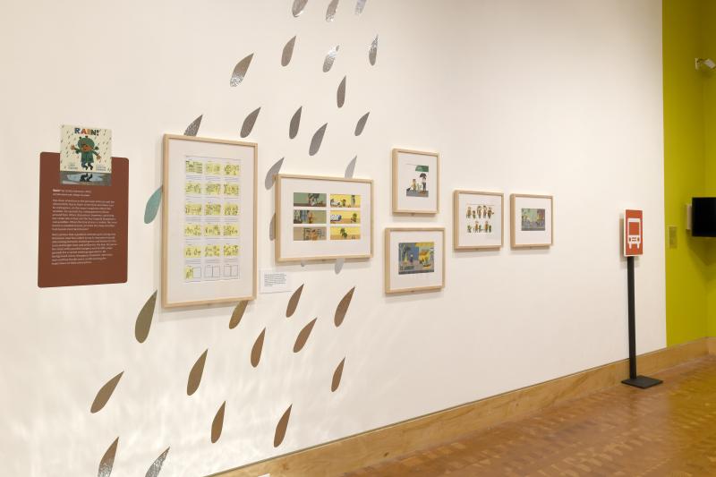 Installation image showing walls with framed art.