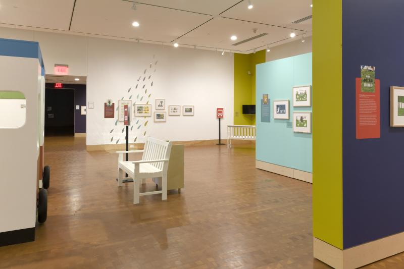Installation image showing walls with framed art.