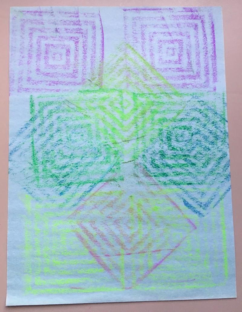 Layered, colorful, square spiral patterns on a piece of paper.