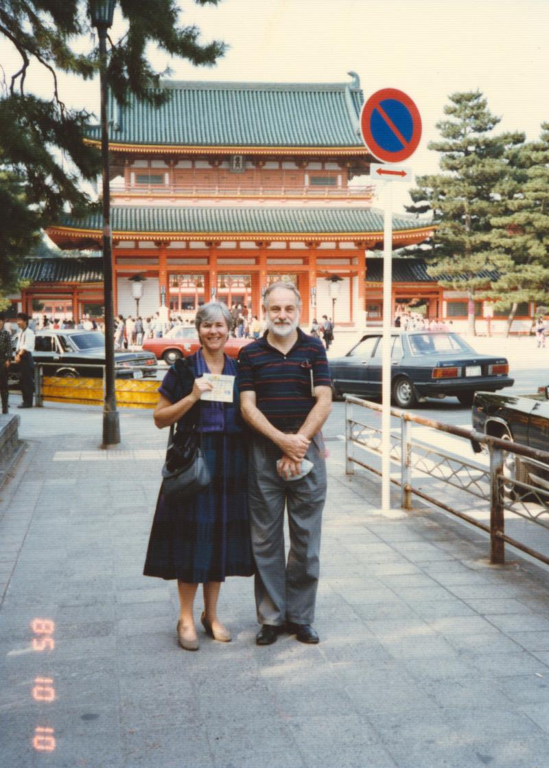 Photograph of Eric and Barbara Carle in front of shrine.