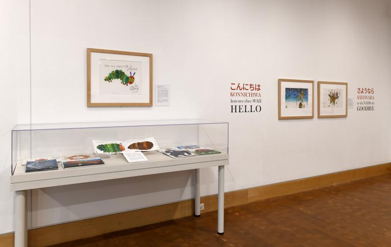Installation image showing walls with framed art.