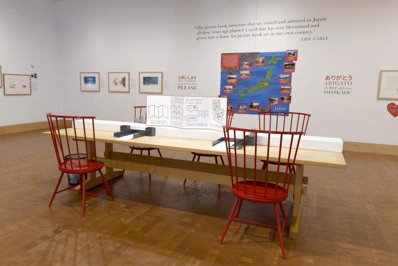 Installation image showing walls with framed art.