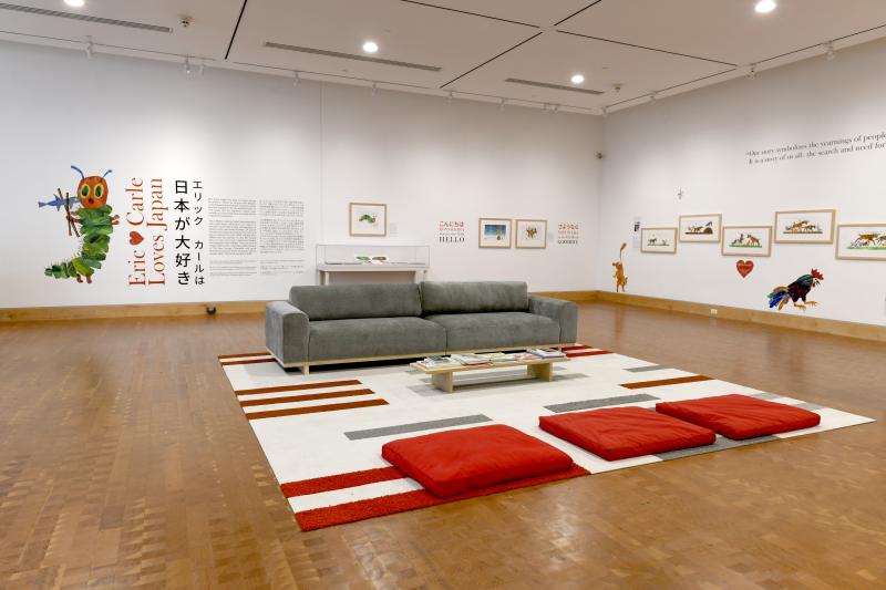 Installation image showing walls with framed art.