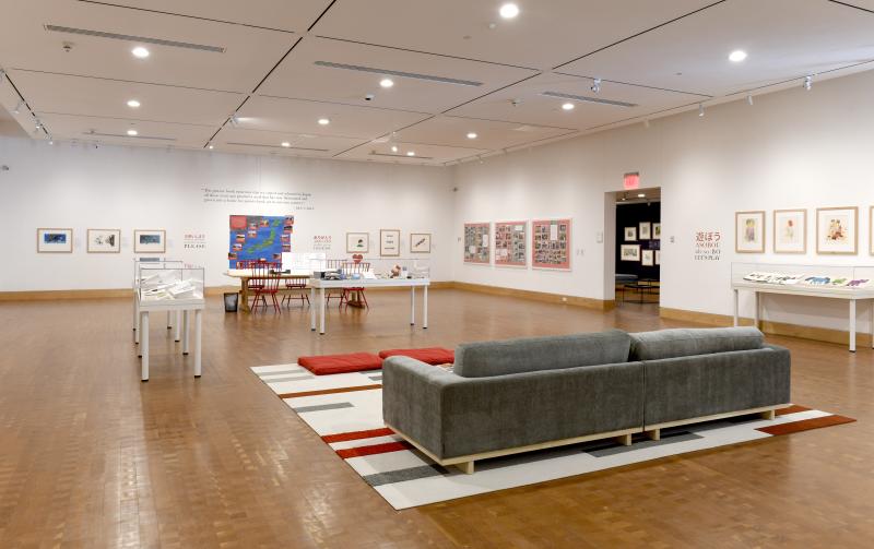 Installation image showing walls with framed art.