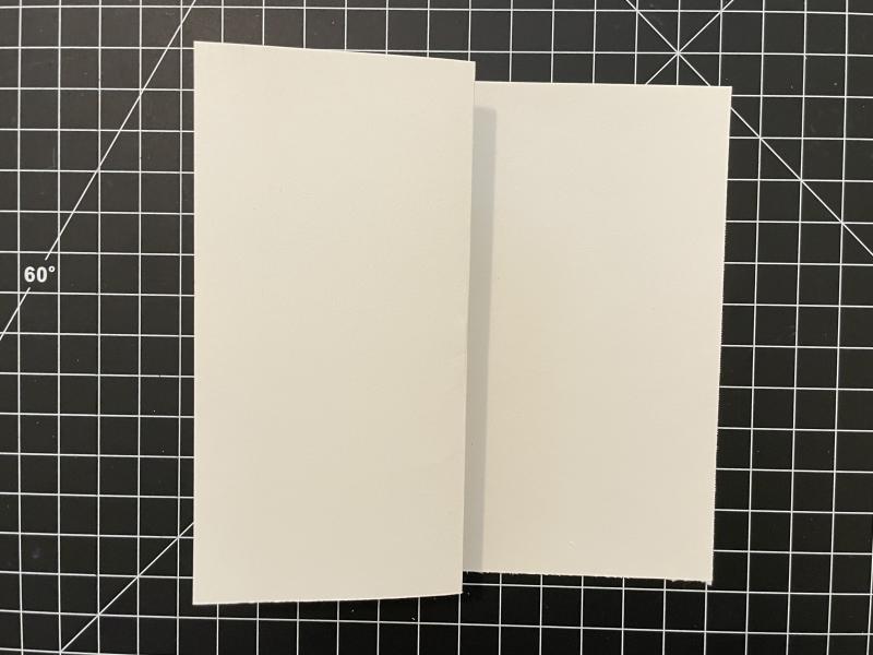 Final image of the folded flipflap book. A 6x12 inch piece of paper folded in half to 6x6 inches and the cover folded back to the spine in half.