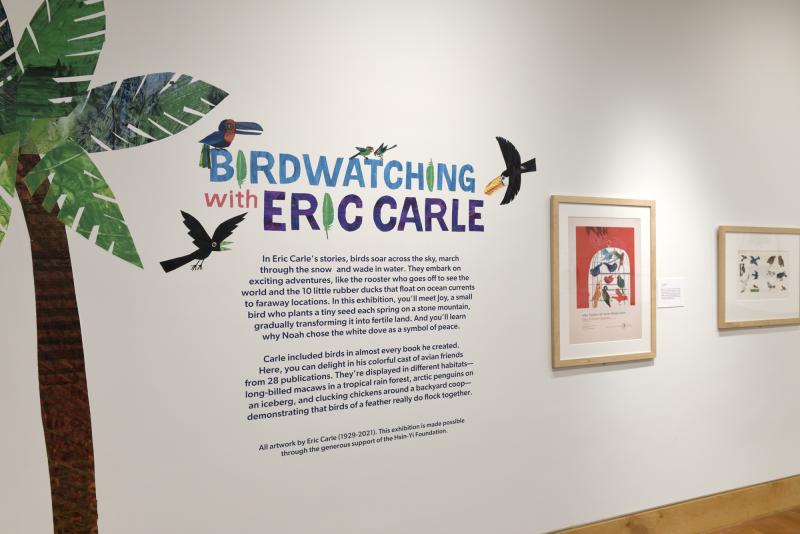 Photograph of gallery showing framed art and graphics.