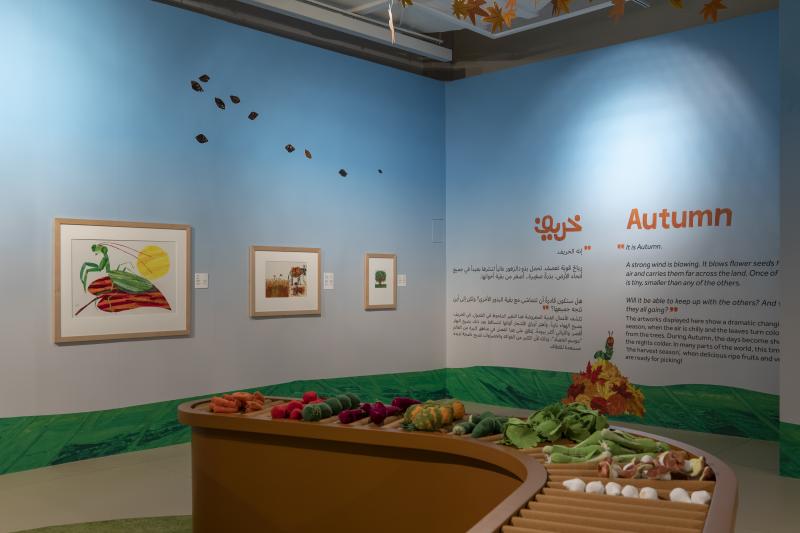 Photograph of gallery showing framed art and graphics.