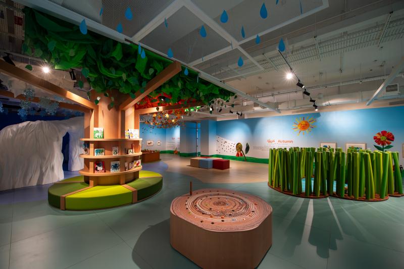 Photograph of gallery showing framed art and graphics.