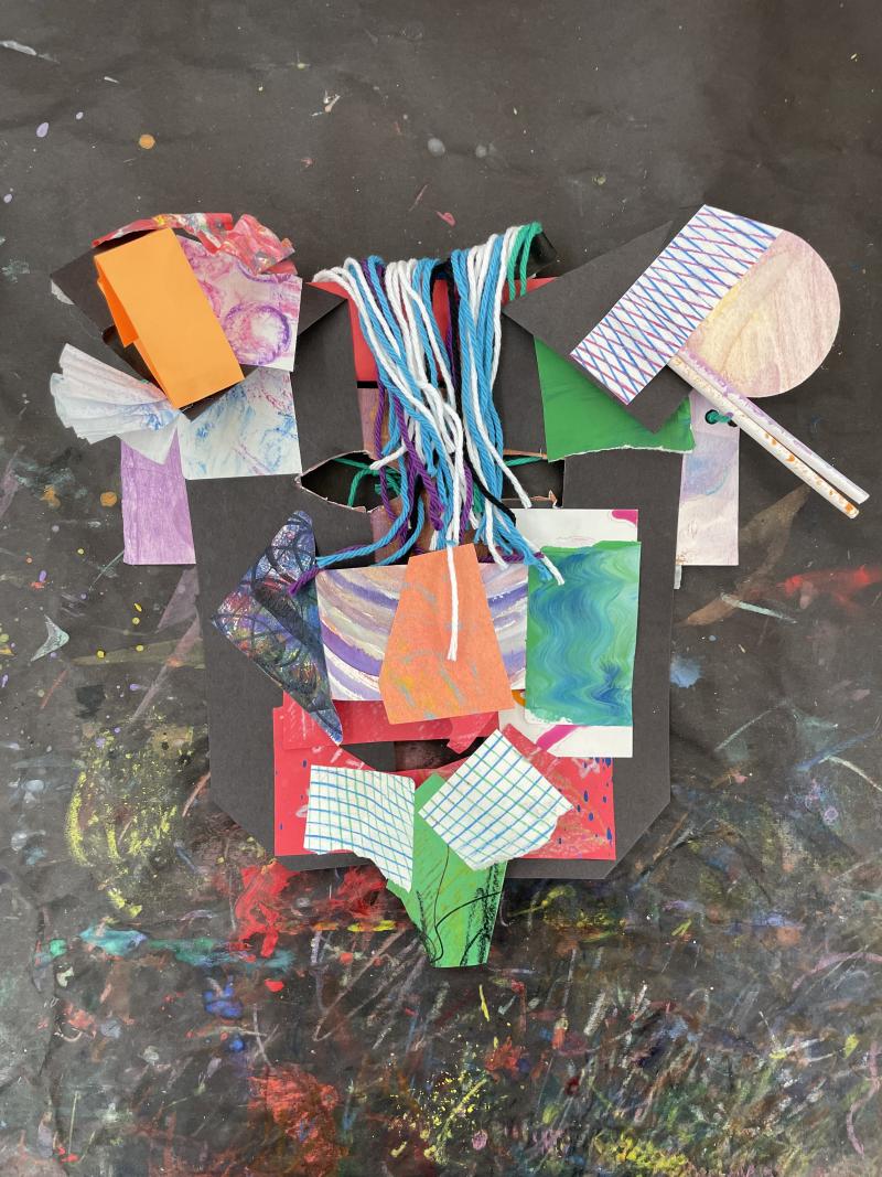 Paper collaged full face mask.