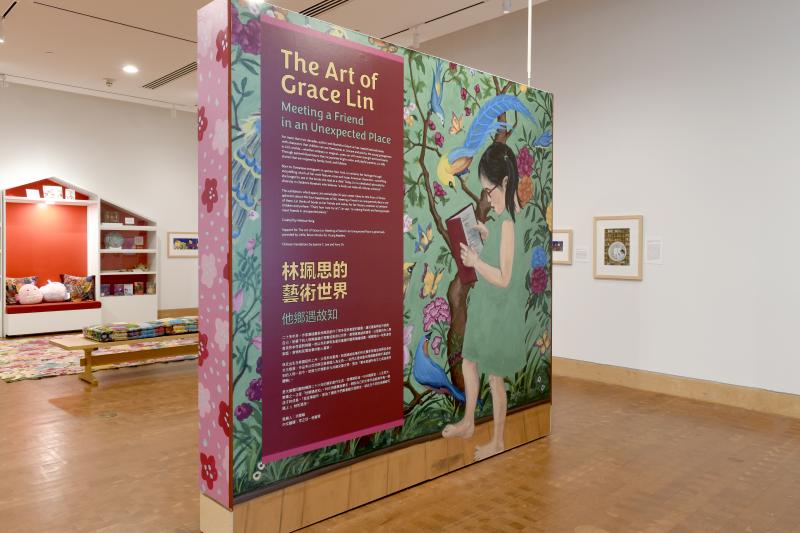 Photograph of gallery showing framed art and graphics.
