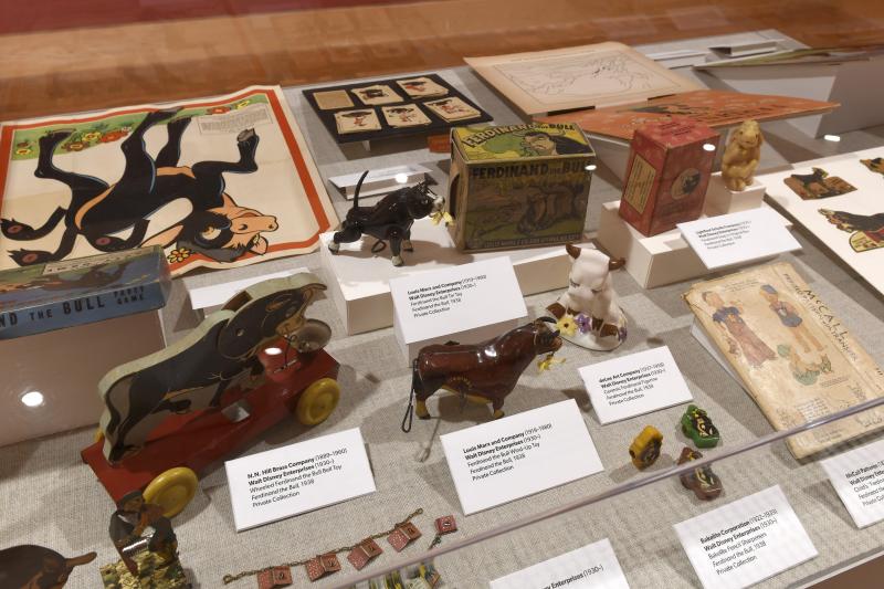 Photograph of gallery showing framed art and graphics.