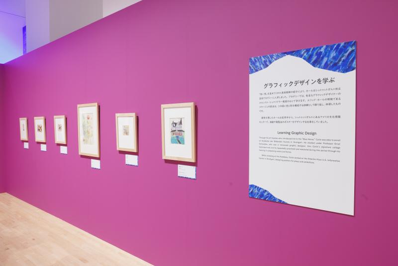 Photograph of gallery showing framed art and graphics.