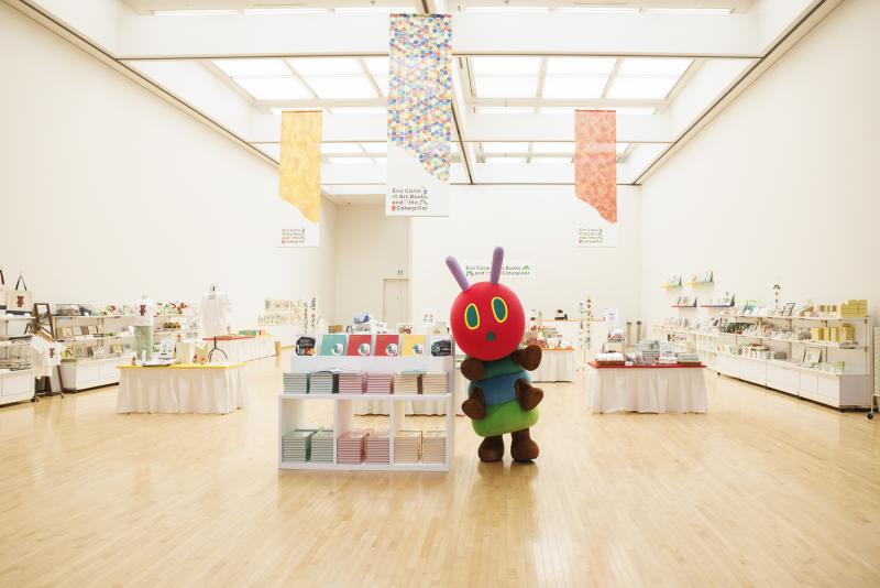 Photograph of gallery showing framed art and graphics.