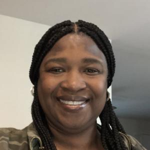 a Black woman smiling