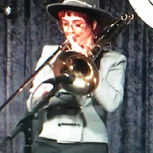 Carolyn Dufraine playing trombone. 