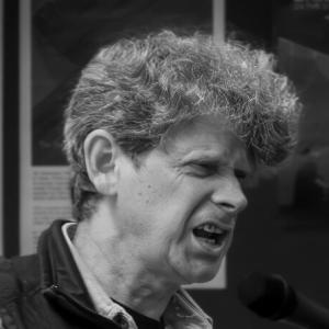 A man giving an impassioned speech.