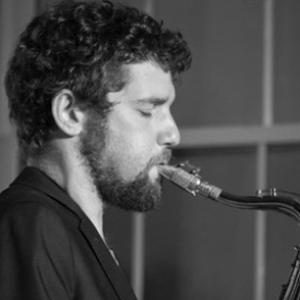 Dan Friedman playing the saxophone. 