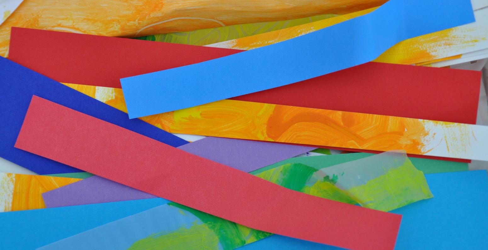 close up of strewn collage paper cut into rectangles