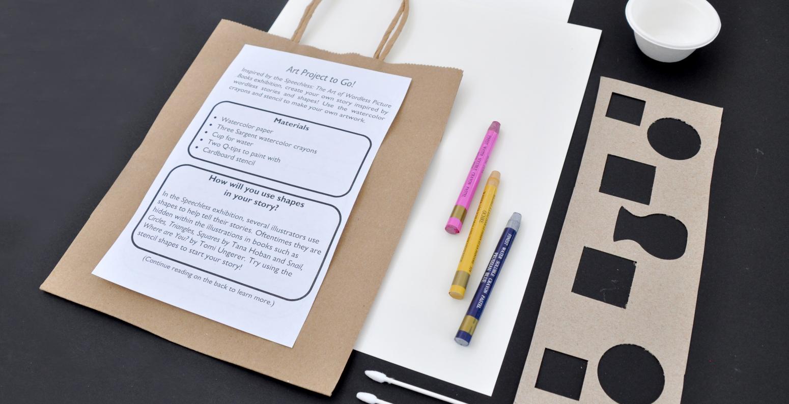 The materials within a watercolor to-go bag: a cup, two cotton swabs, a stencil, three watercolor crayons, two watercolor papers, a paper bag, and a flyer. 
